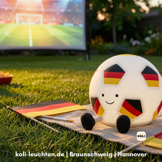 Akku-Tischleuchte Fußball schwarz-rot-gold