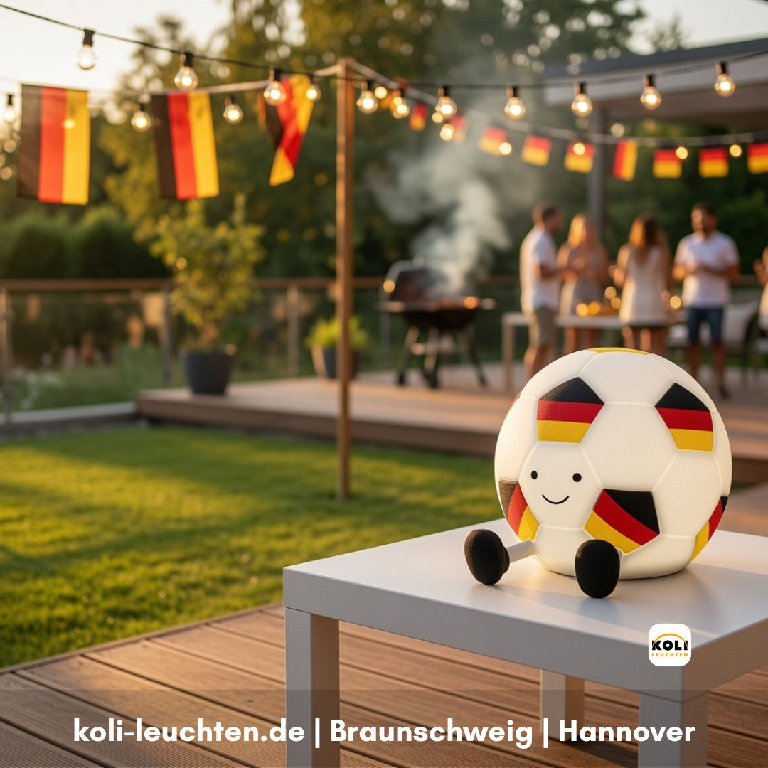 Akku-Tischleuchte Fußball schwarz-rot-gold